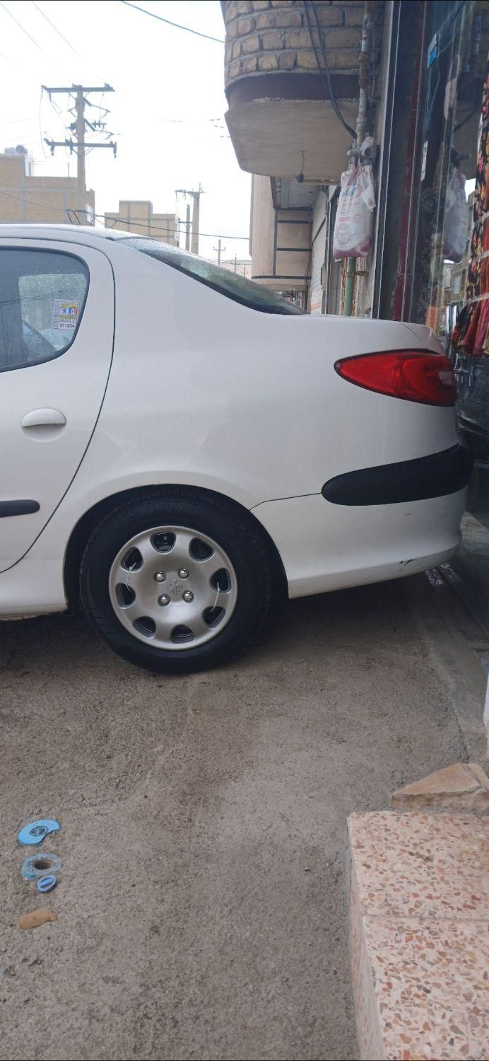پژو ۲۰۶ صندوق دار v8 - 1395