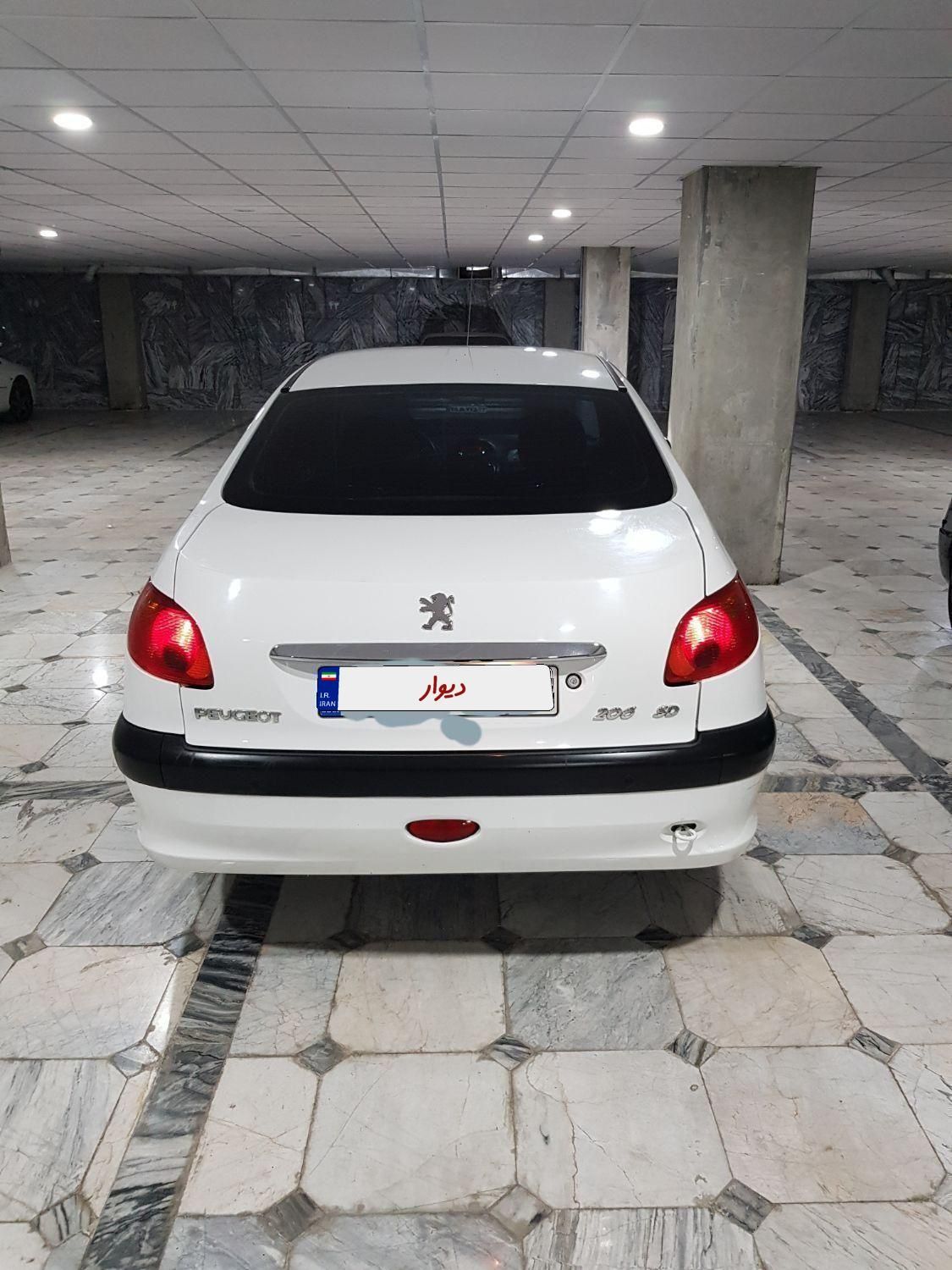 پژو ۲۰۶ صندوق دار v8 - 1396