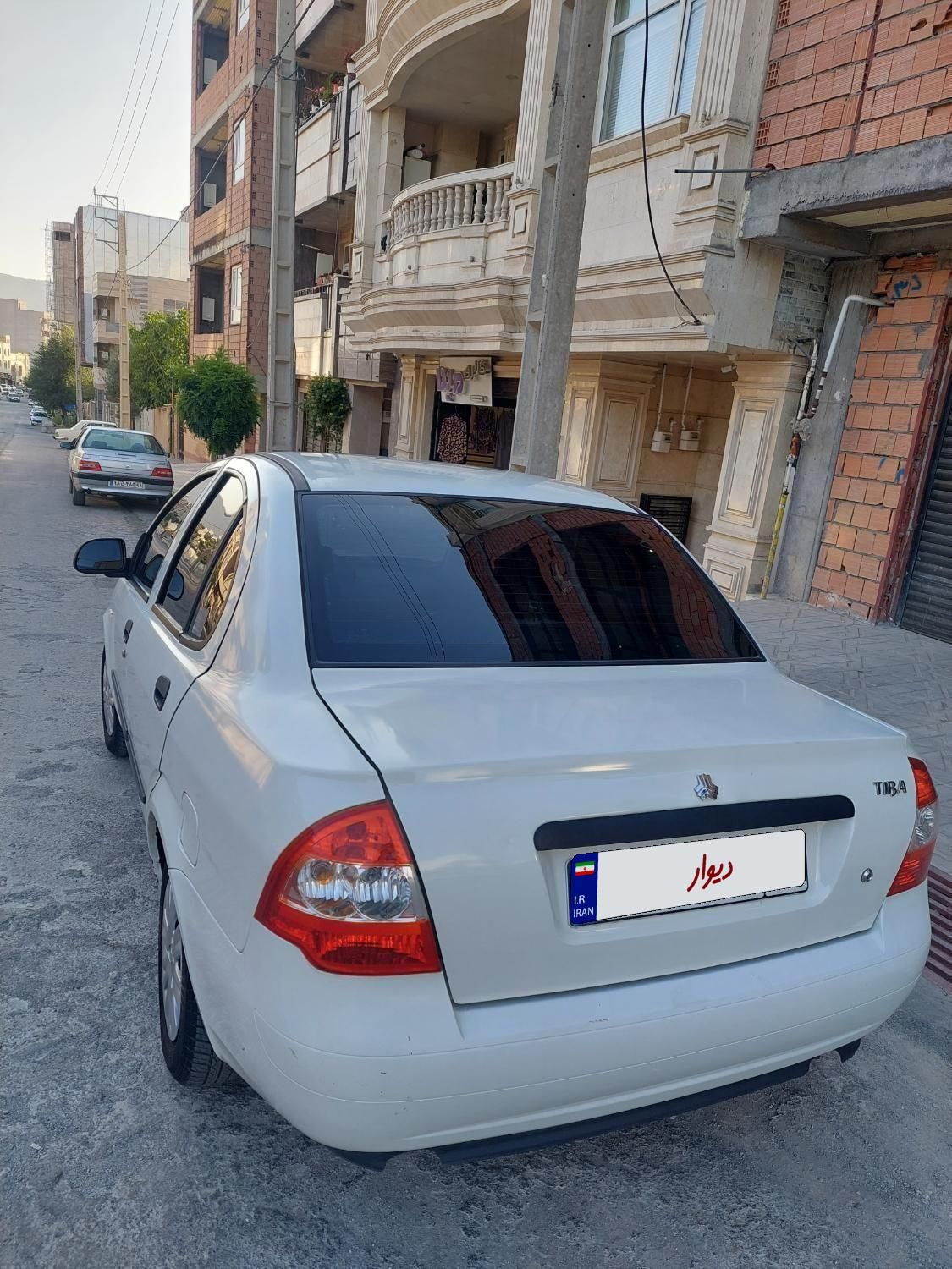 تیبا صندوق دار SX - 1400