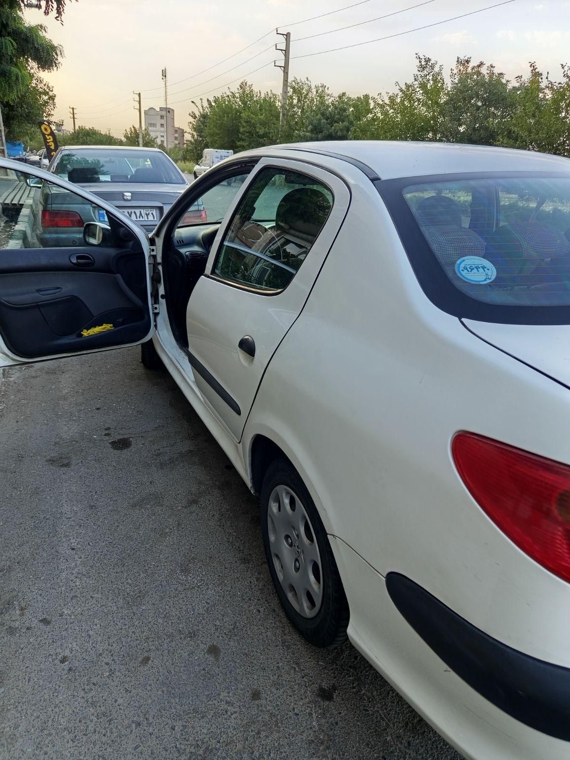 پژو ۲۰۶ صندوق دار v8 - 1396