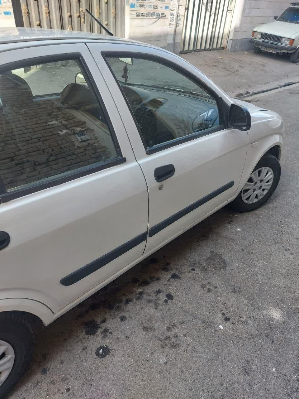 تیبا صندوق دار SX - 1393