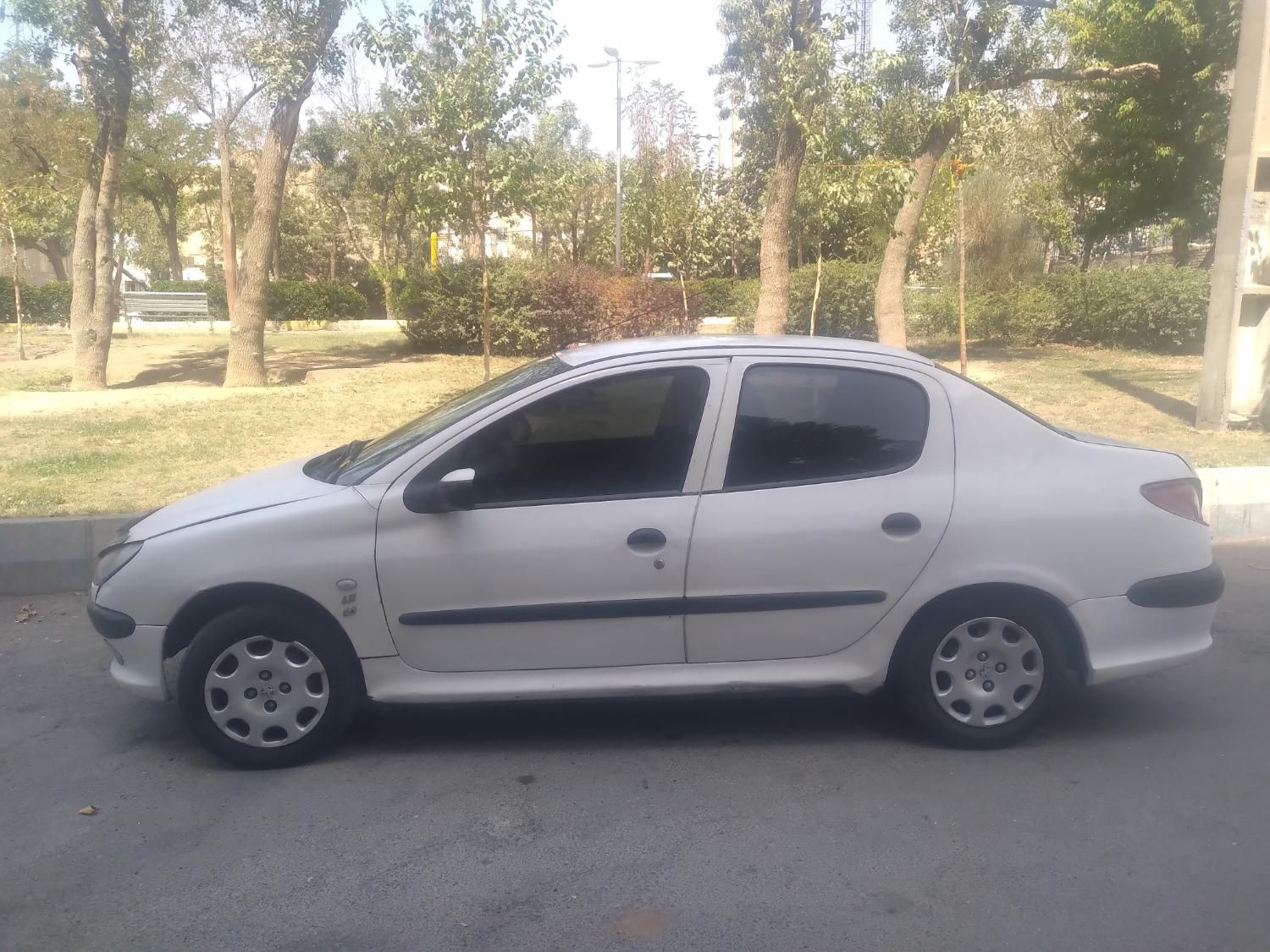 پژو ۲۰۶ صندوق دار v8 - 1394
