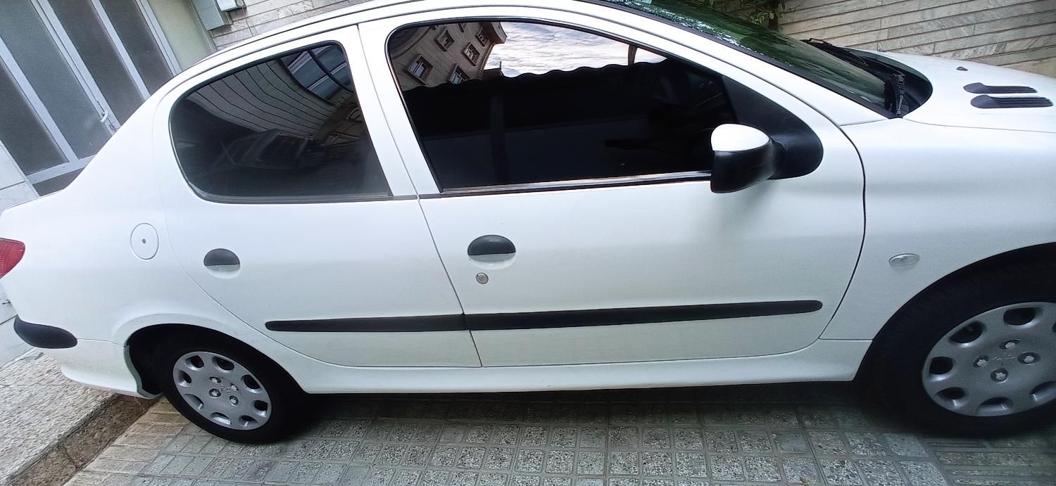 پژو ۲۰۶ صندوق دار v8 - 1395