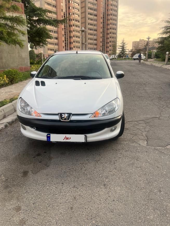 پژو ۲۰۶ صندوق دار v8 - 1399