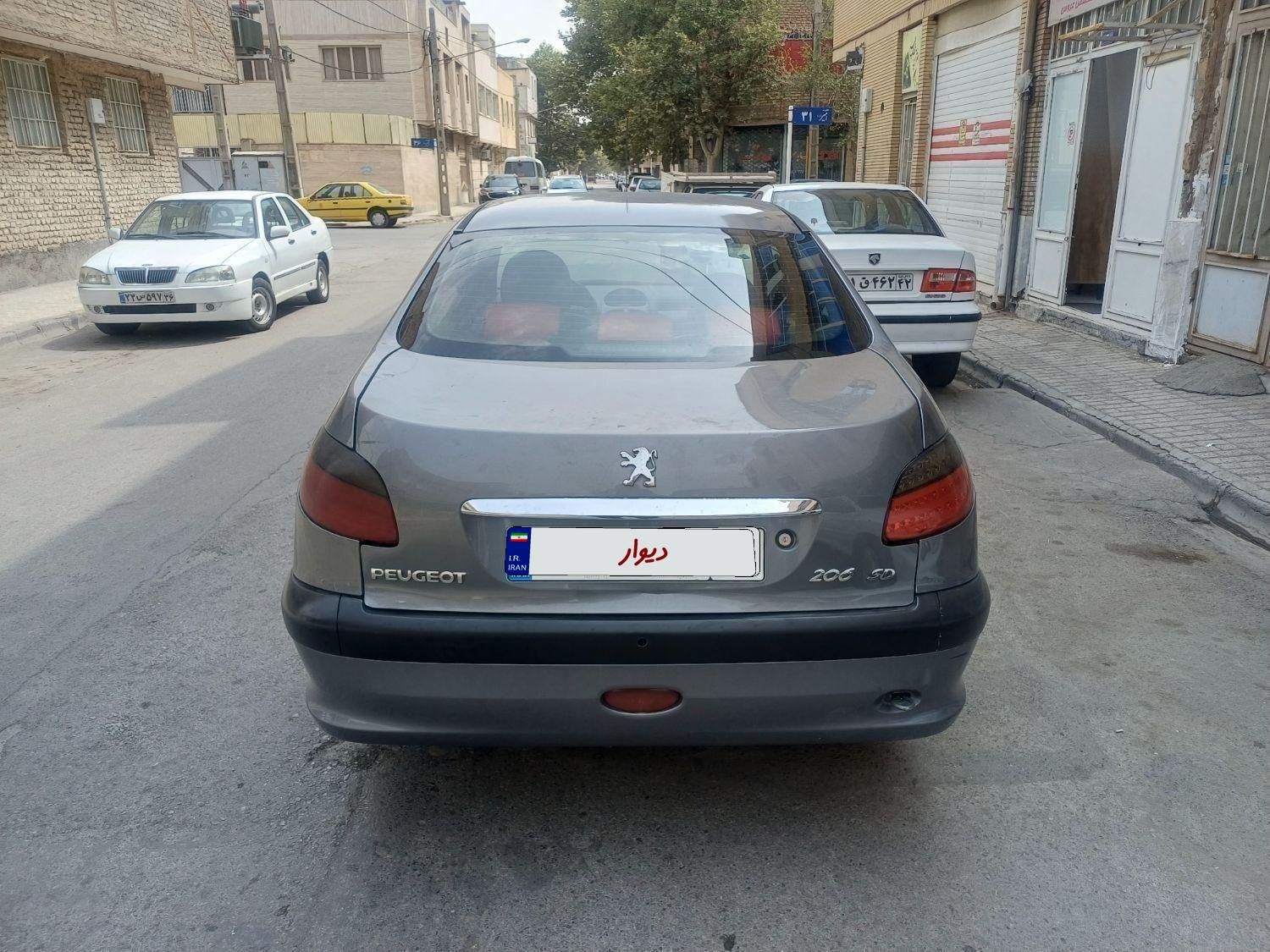 پژو ۲۰۶ صندوق دار v8 - 1391