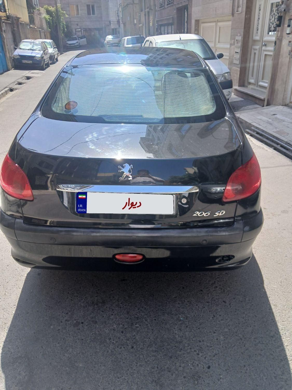 پژو ۲۰۶ صندوق دار v8 - 1396