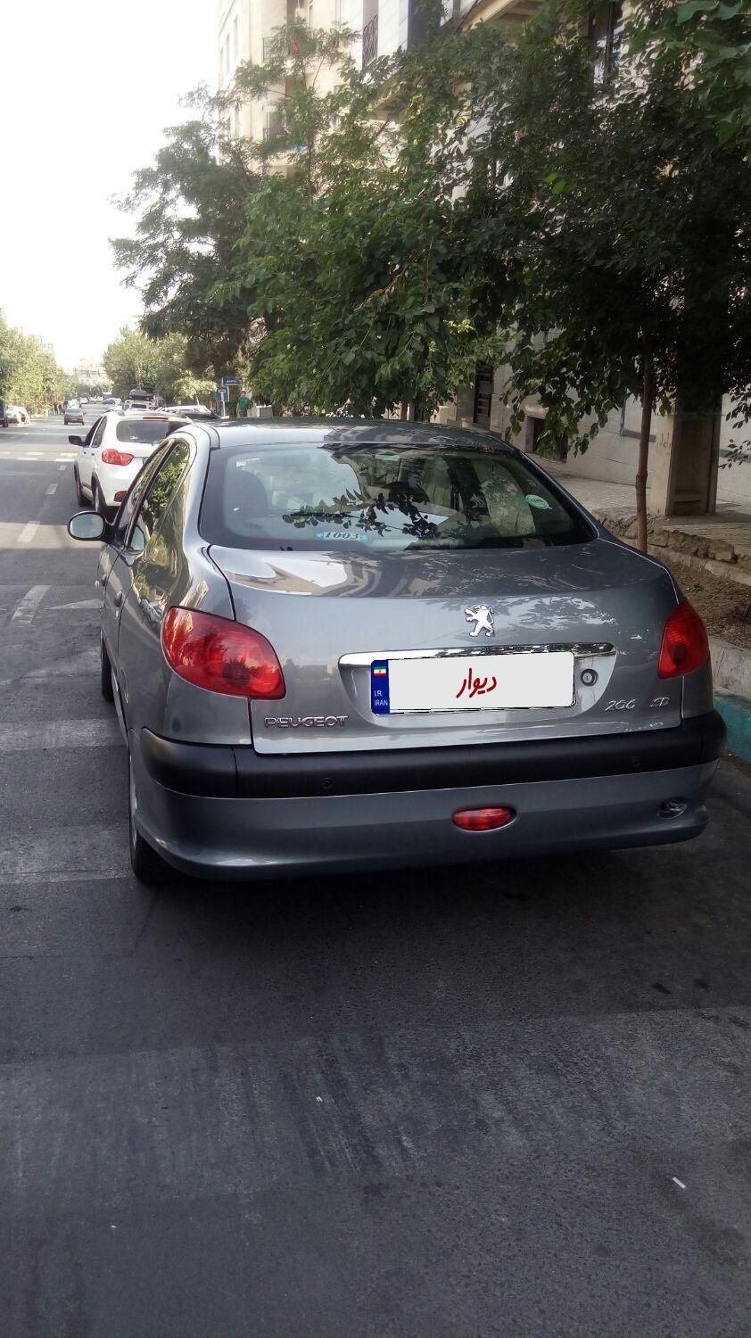 پژو ۲۰۶ صندوق دار v8 - 1394