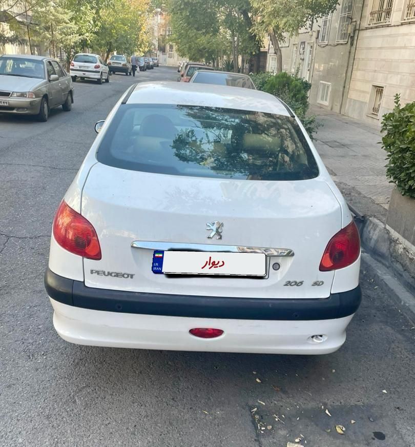 پژو ۲۰۶ صندوق دار v8 - 1394