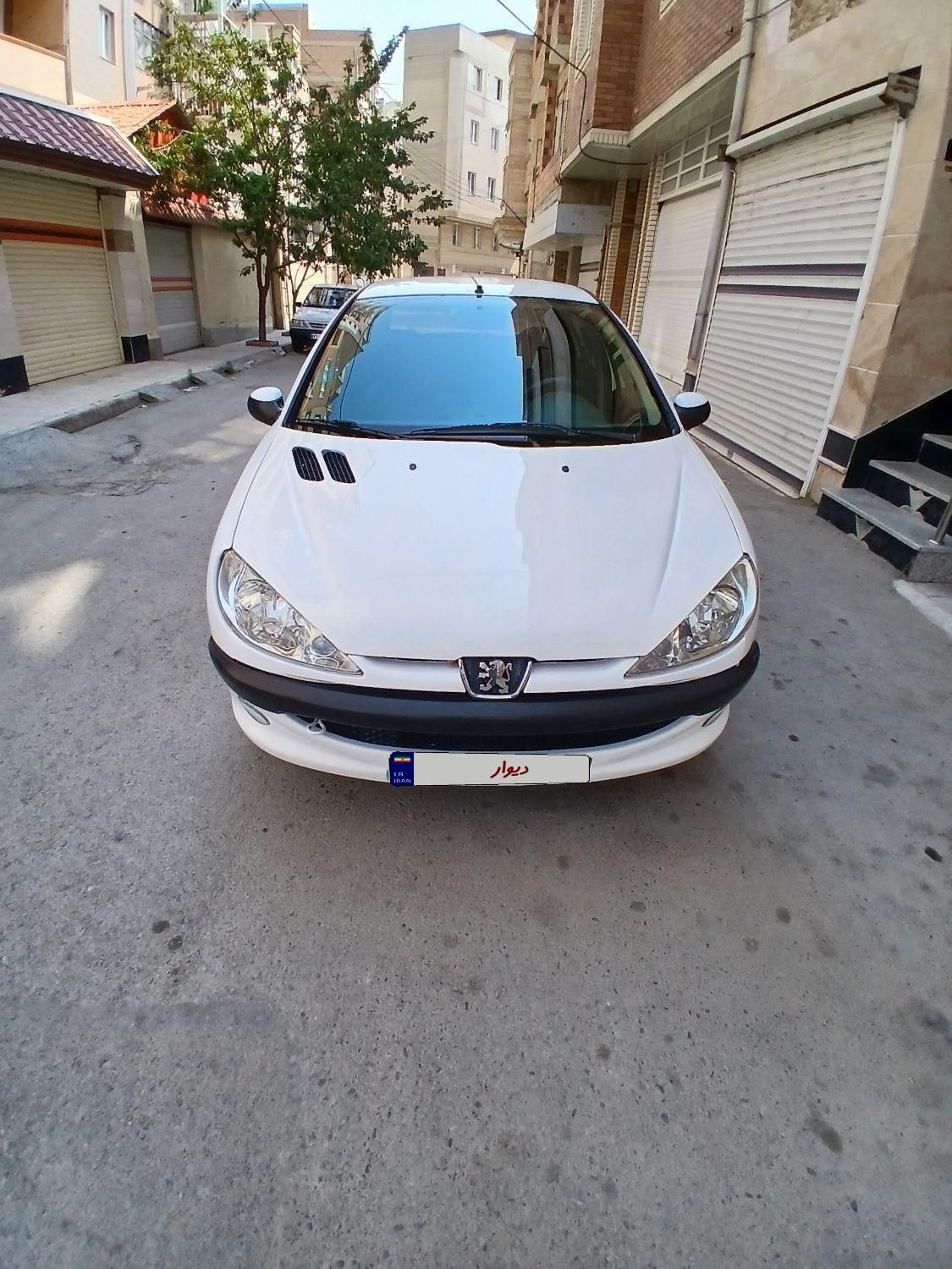 پژو ۲۰۶ صندوق دار v8 - 1391