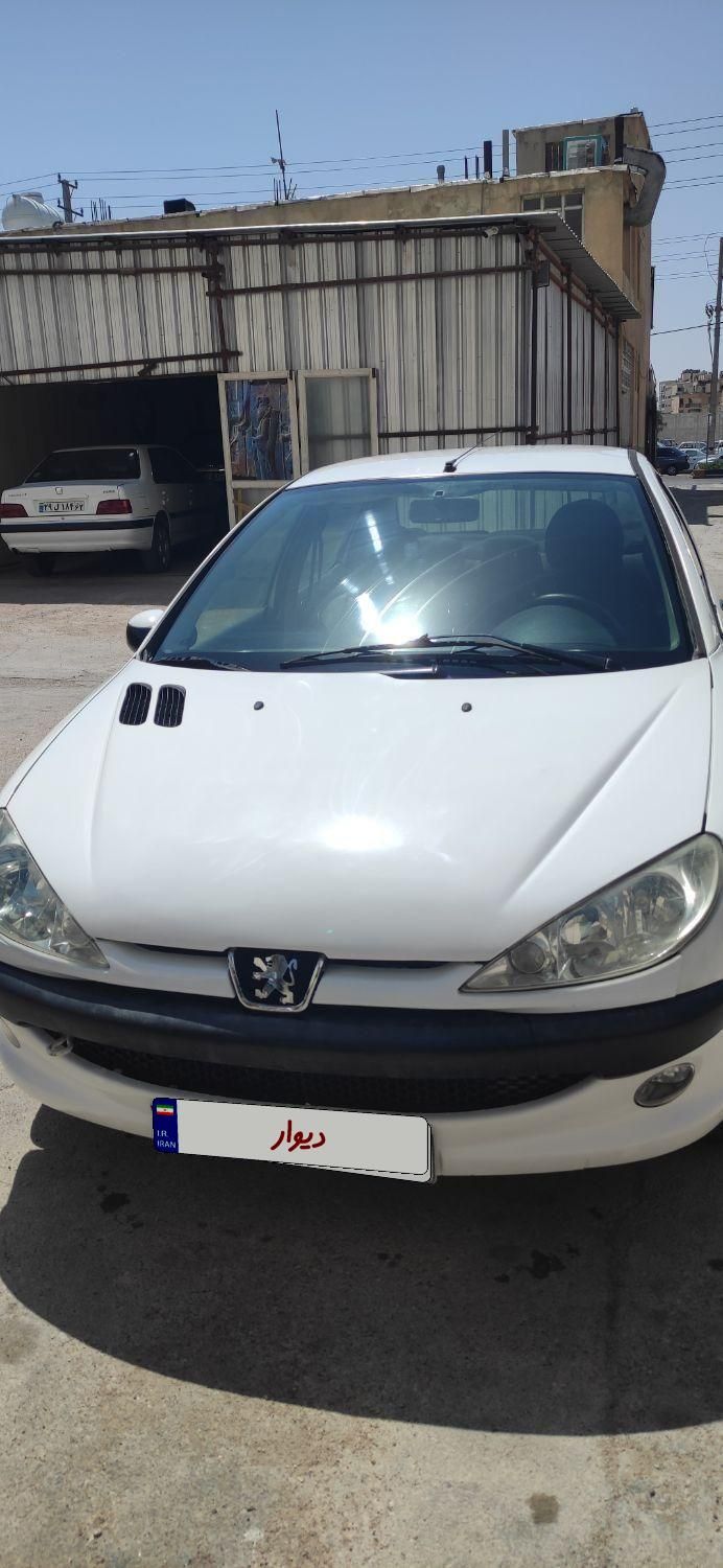 پژو ۲۰۶ صندوق دار v8 - 1391