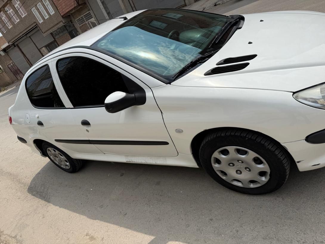 پژو ۲۰۶ صندوق دار v8 - 1399
