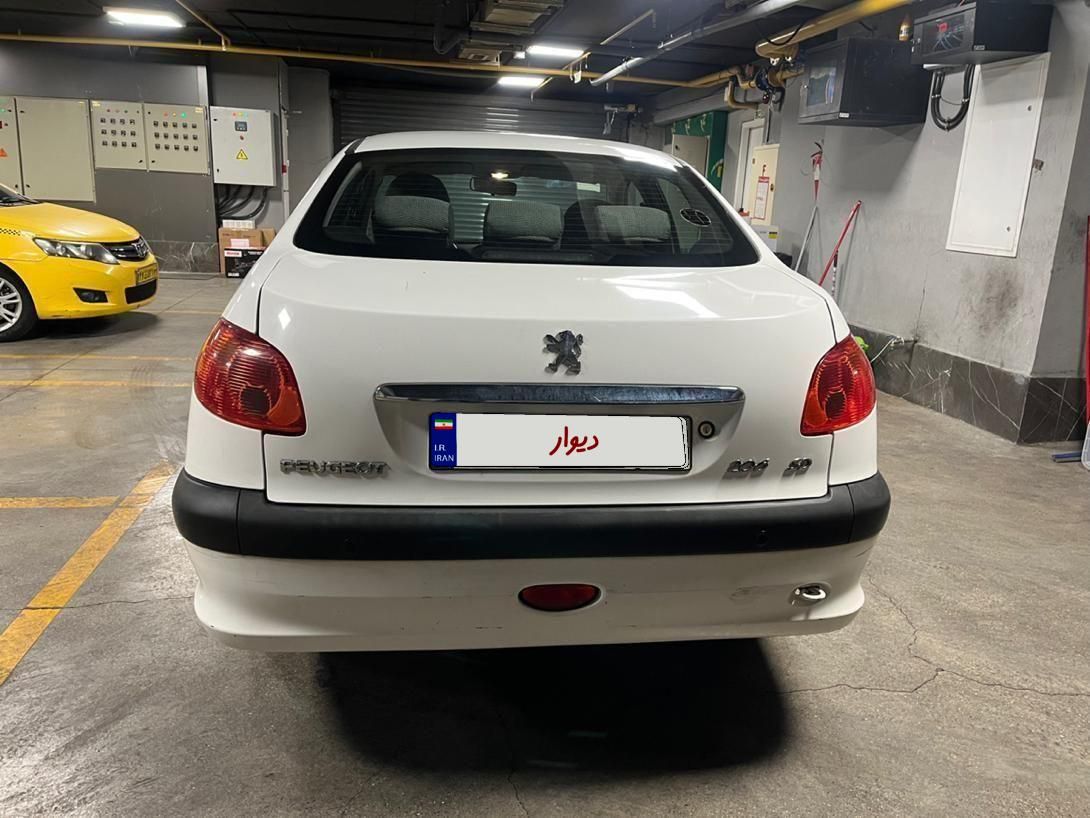 پژو ۲۰۶ صندوق دار v8 - 1395