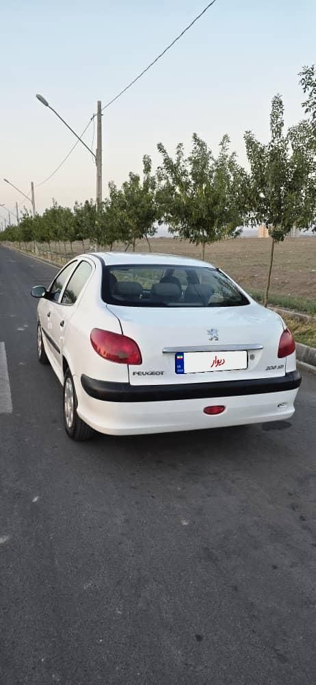 پژو ۲۰۶ صندوق دار v8 - 1396