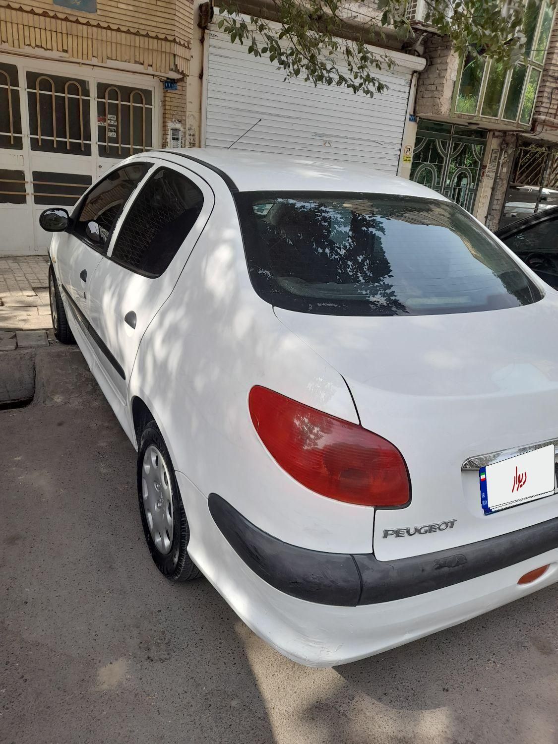 پژو ۲۰۶ صندوق دار v20 - 1391