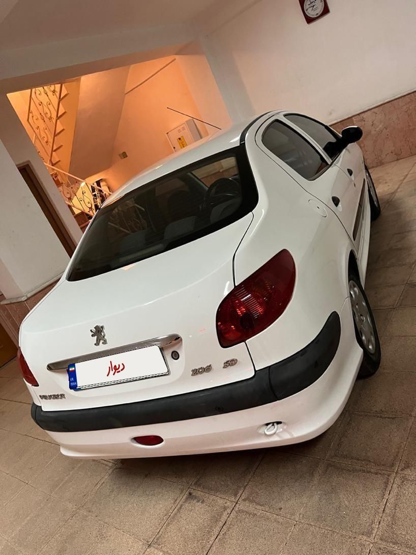 پژو ۲۰۶ صندوق دار v8 - 1394