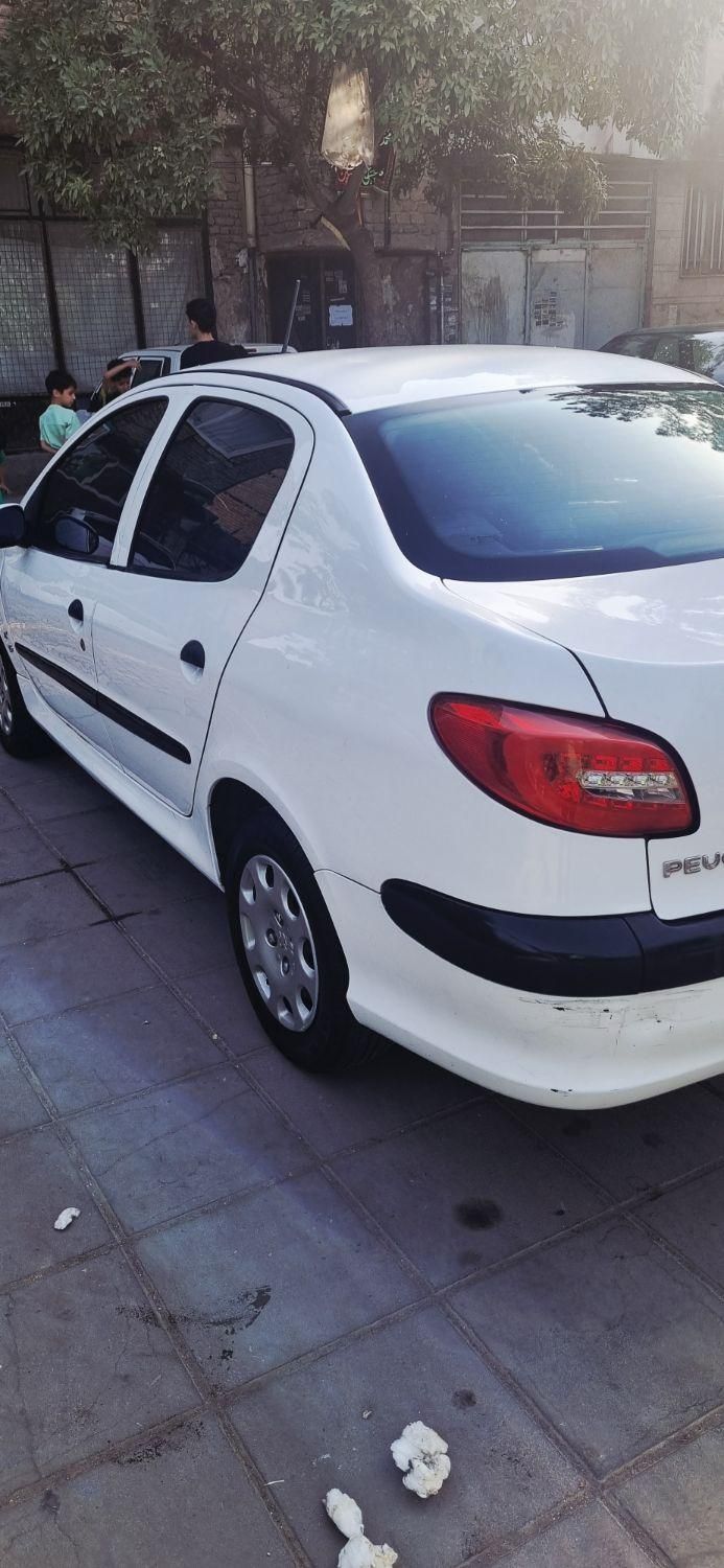 پژو ۲۰۶ صندوق دار v8 - 1391