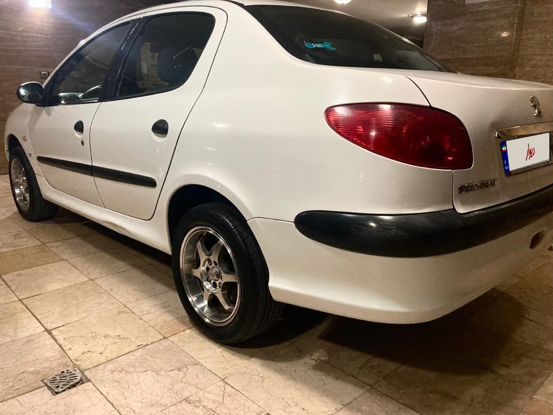پژو ۲۰۶ صندوق دار v8 - 1390