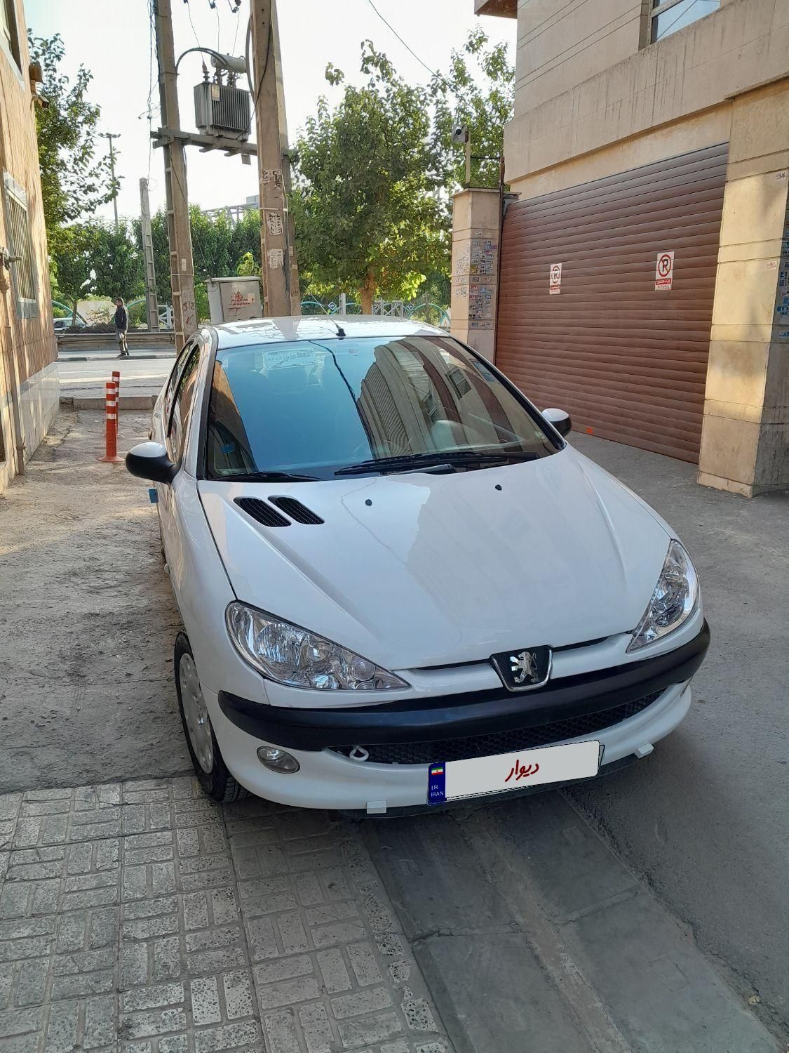 پژو ۲۰۶ صندوق دار v8 - 1396
