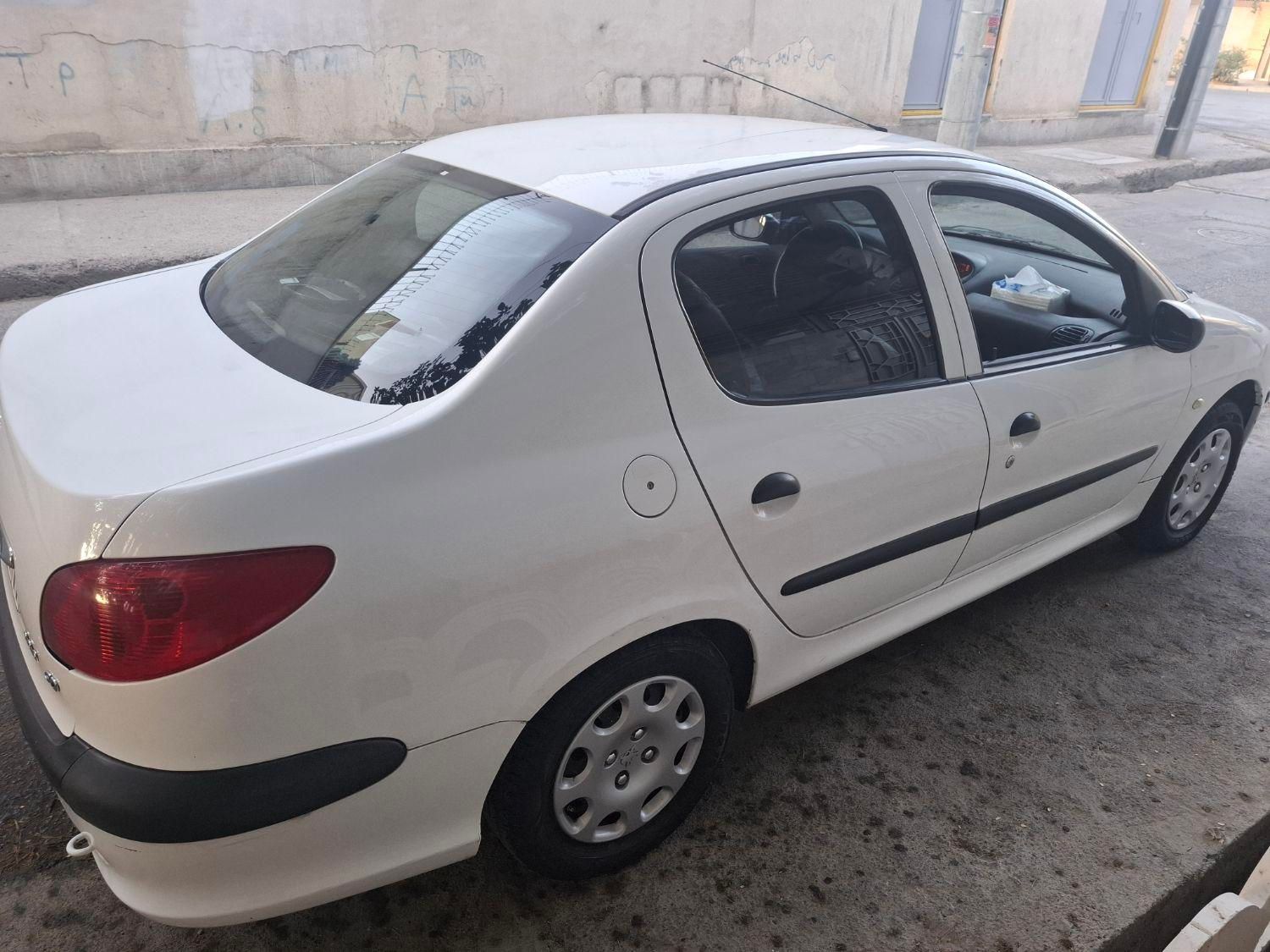 پژو ۲۰۶ صندوق دار v8 - 1395