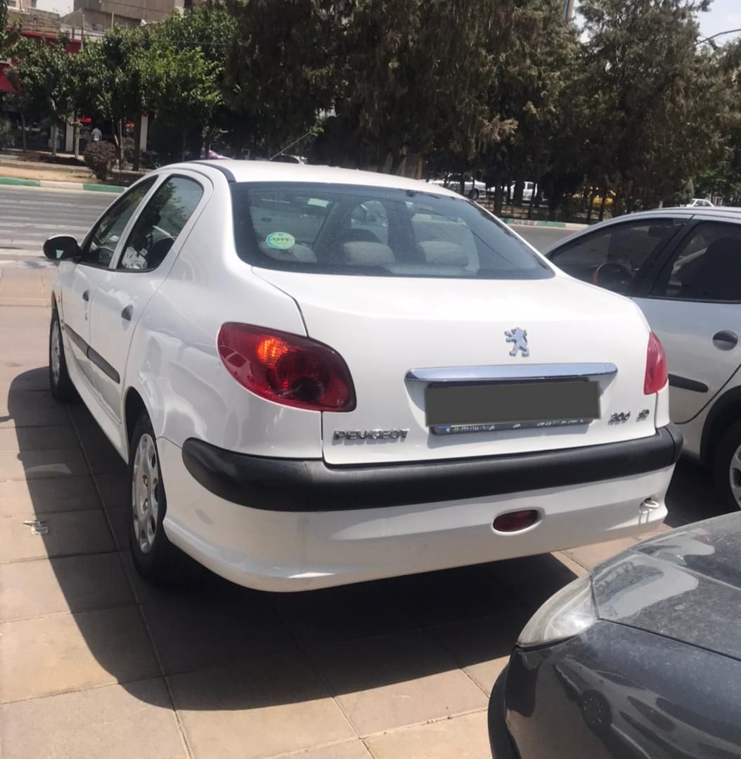 پژو ۲۰۶ صندوق دار v8 - 1398