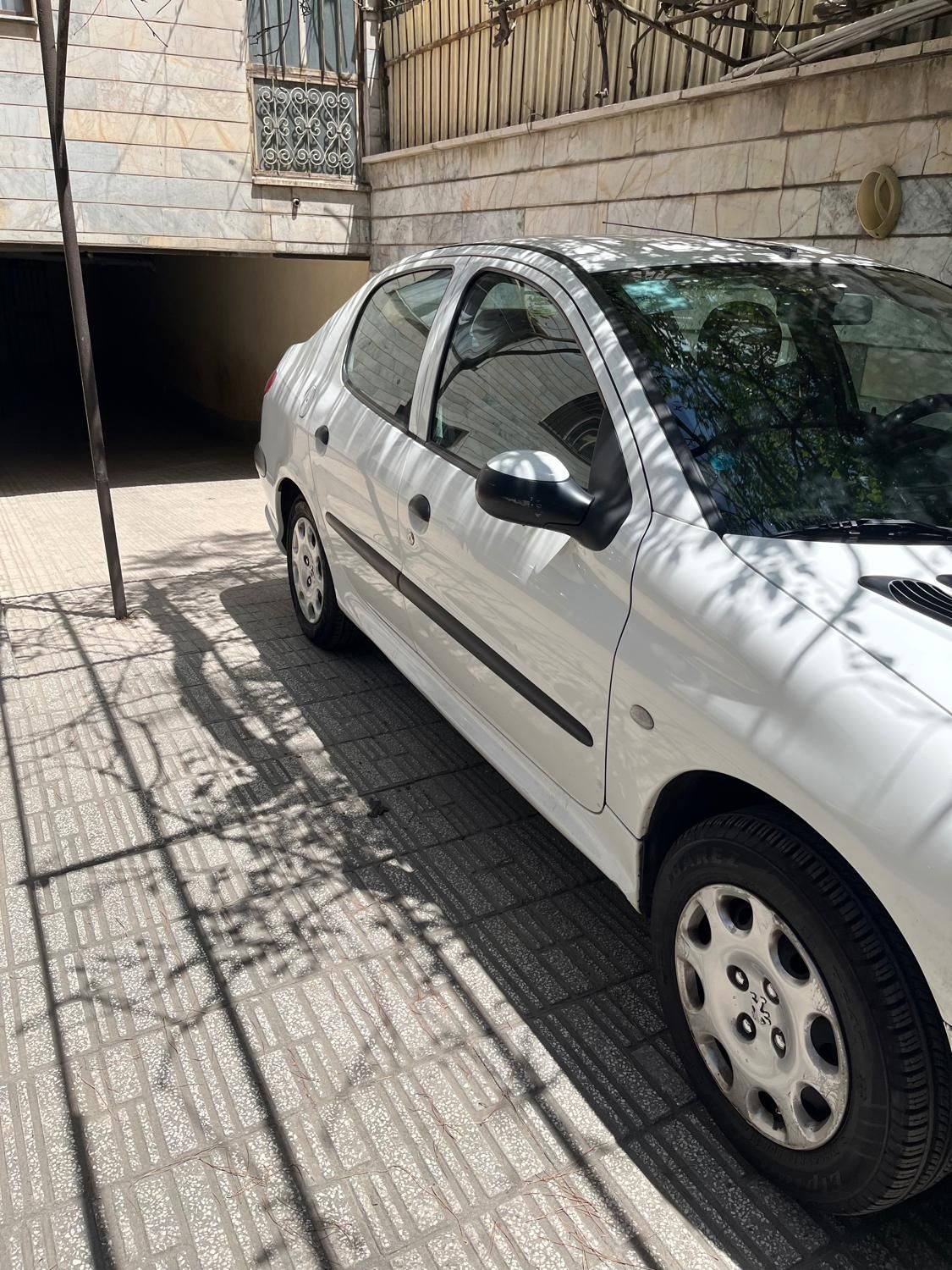 پژو ۲۰۶ صندوق دار v8 - 1396