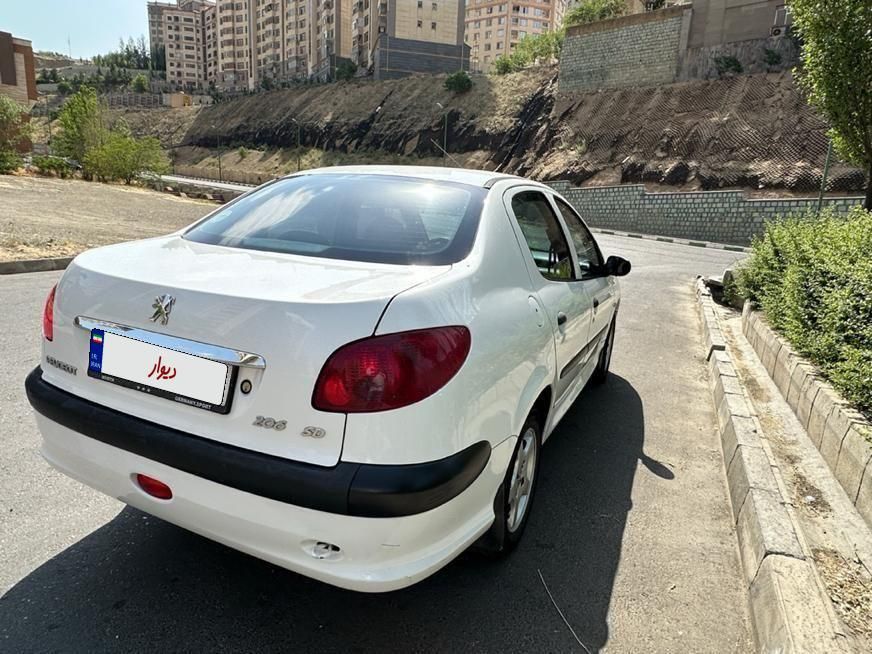 پژو ۲۰۶ صندوق دار v8 - 1399