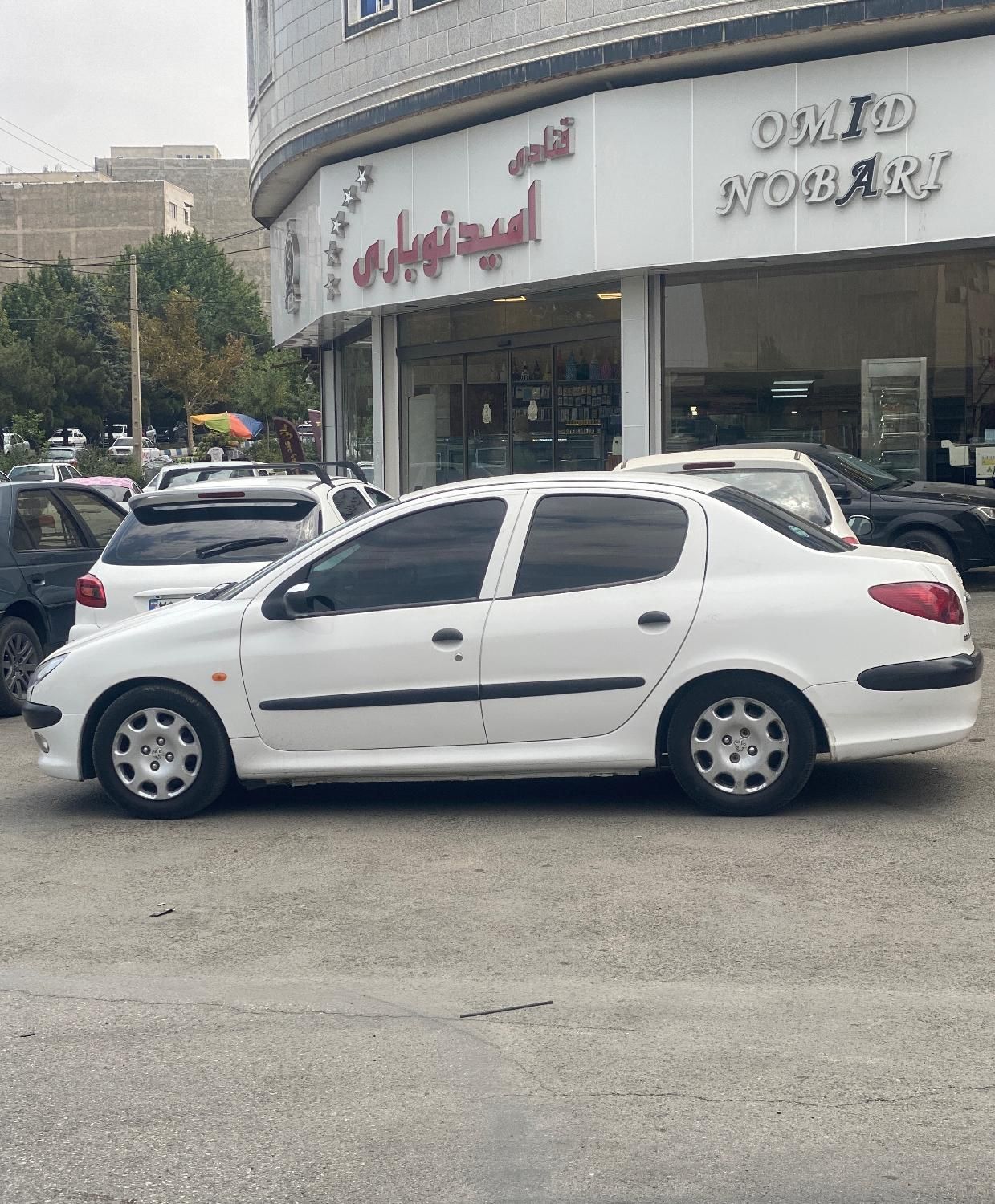 پژو ۲۰۶ صندوق دار v8 - 1398