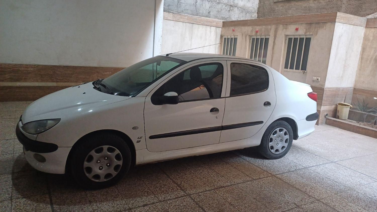 پژو ۲۰۶ صندوق دار v8 - 1395