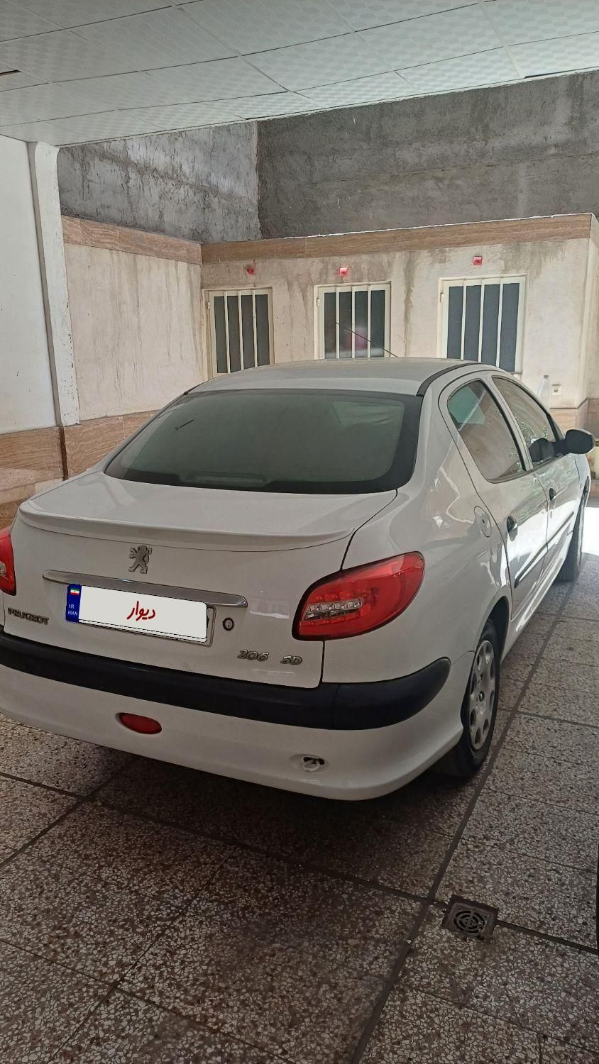پژو ۲۰۶ صندوق دار v8 - 1395