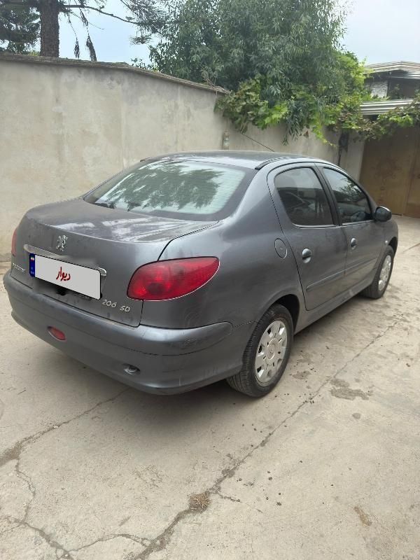 پژو ۲۰۶ صندوق دار v8 - 1390