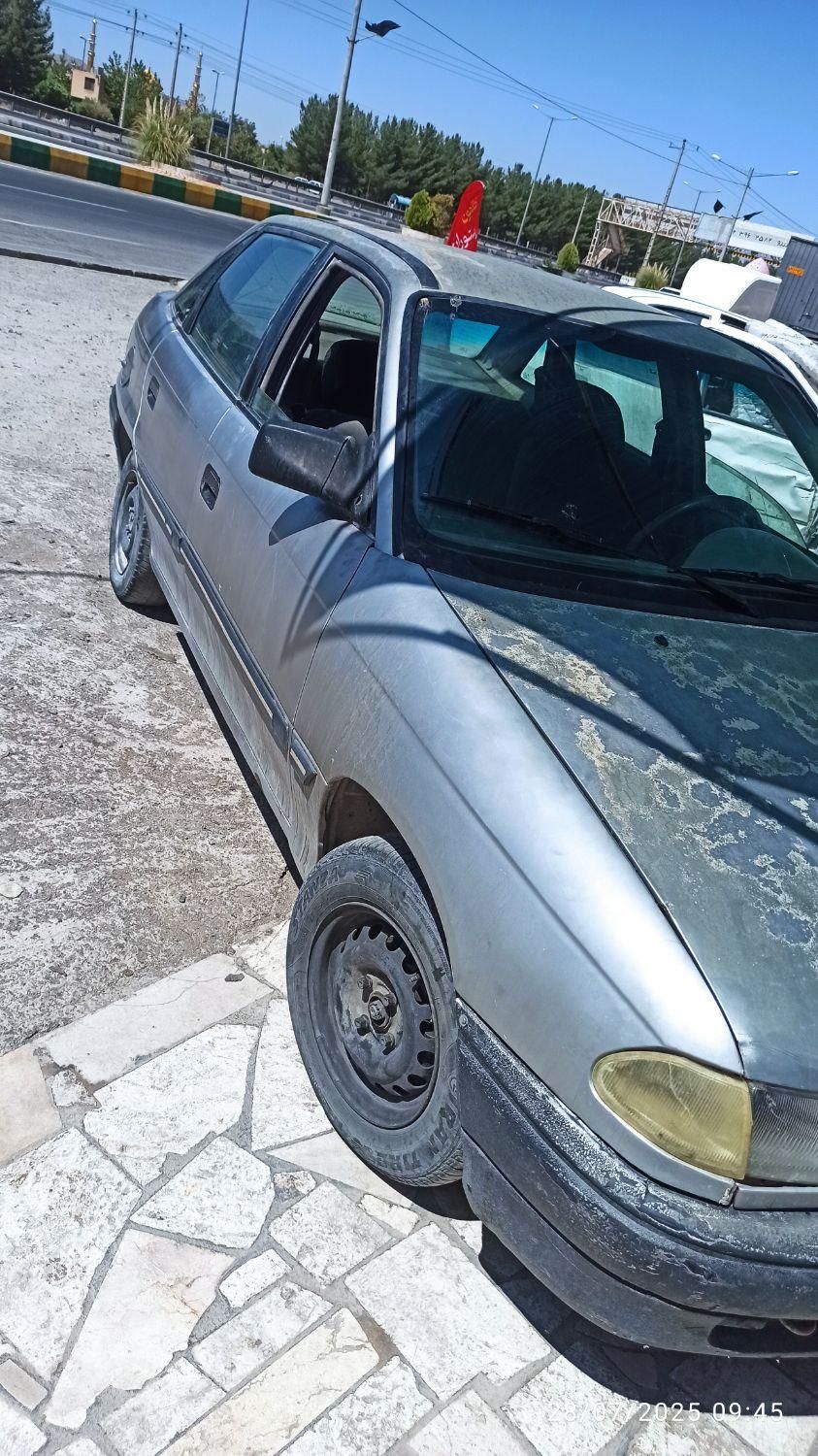 اپل آسترا هاچ بک 1600 شرکتی J - 1996