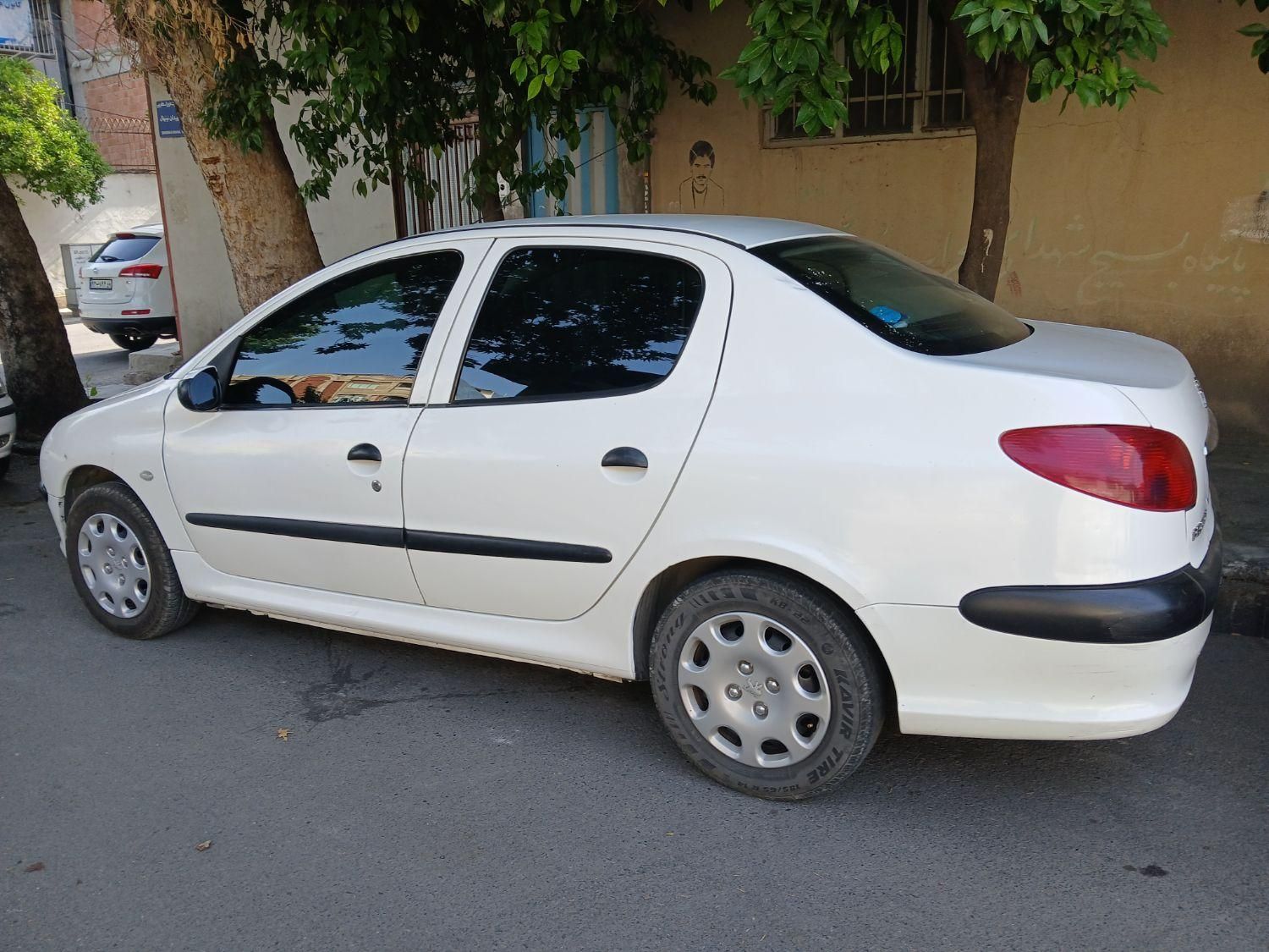 پژو ۲۰۶ صندوق دار v8 - 1394