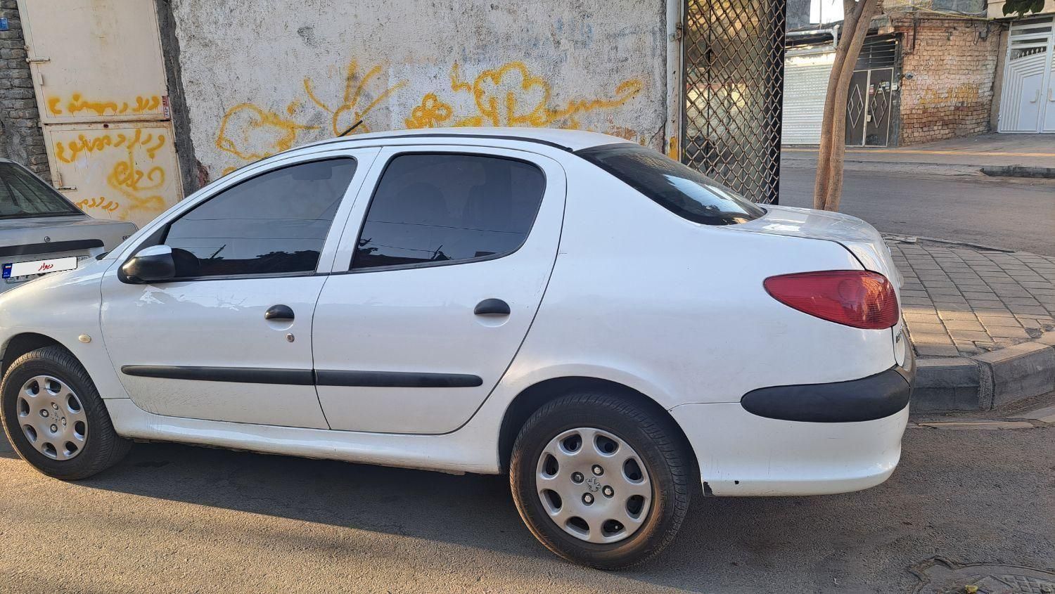 پژو ۲۰۶ صندوق دار v8 - 1391