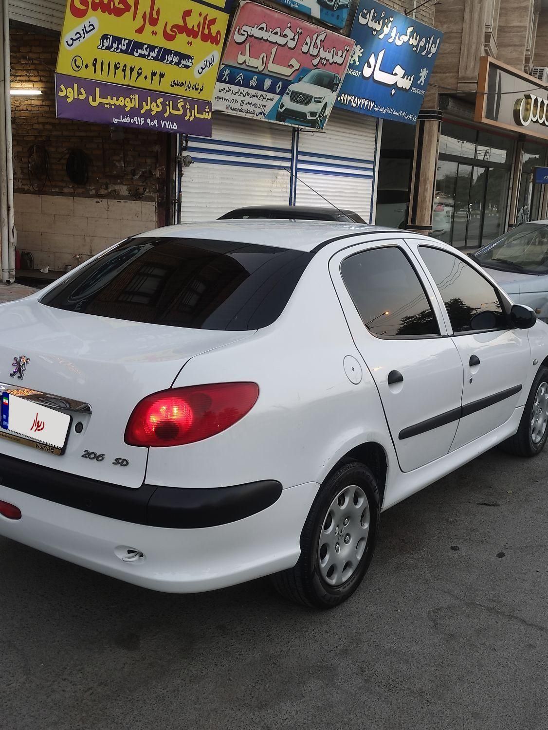 پژو ۲۰۶ صندوق دار v8 - 1395