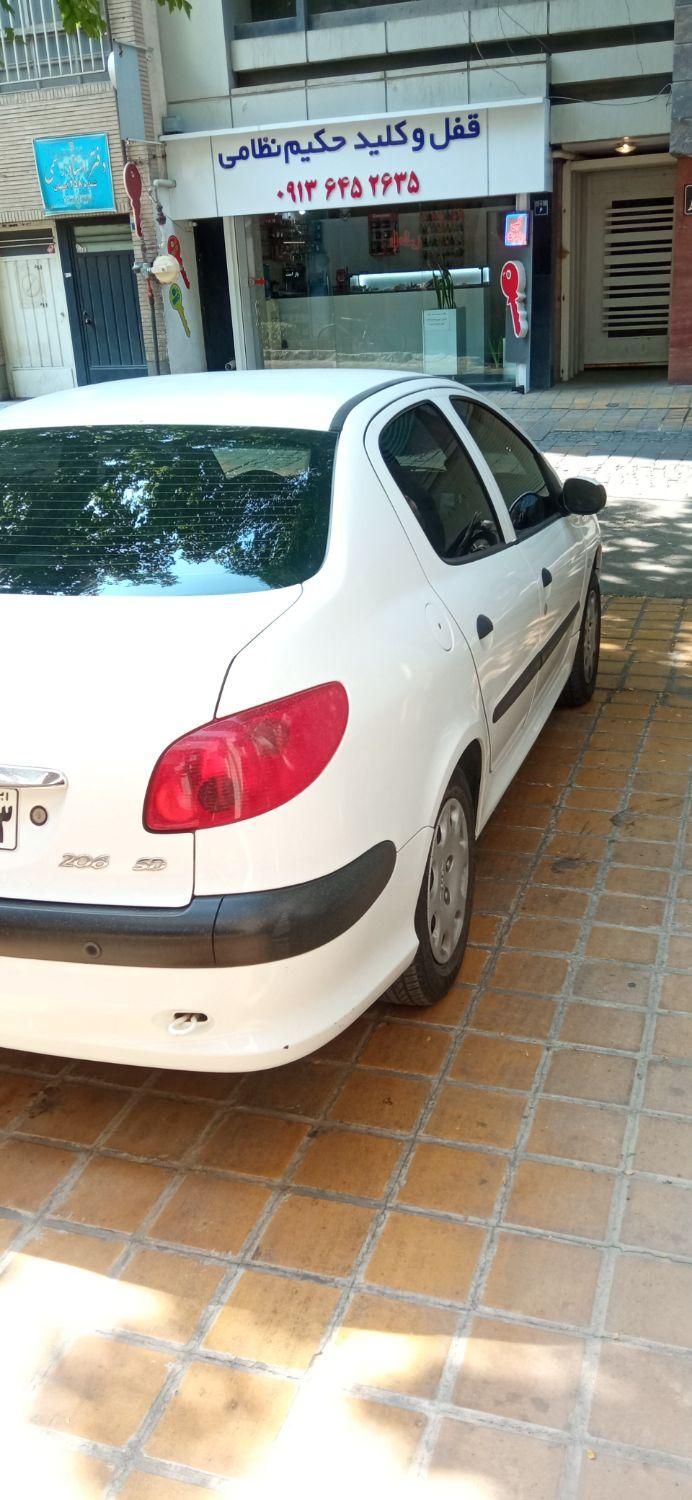 پژو ۲۰۶ صندوق دار v8 - 1396