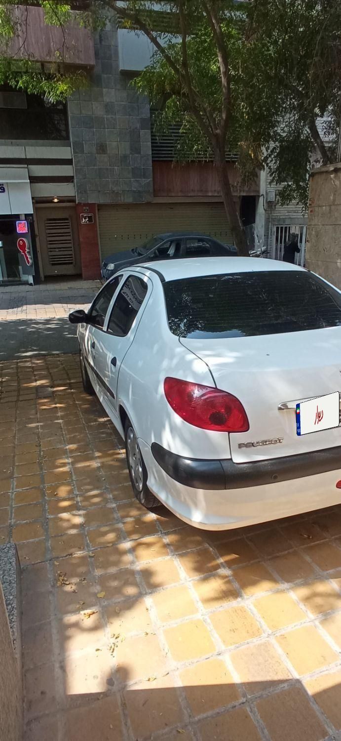 پژو ۲۰۶ صندوق دار v8 - 1396