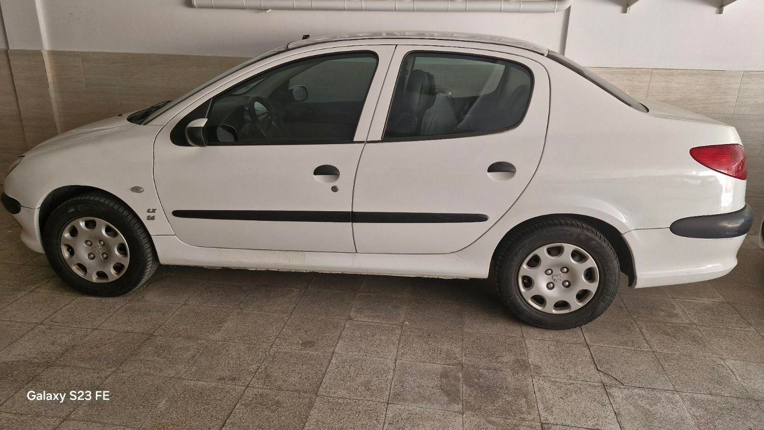 پژو ۲۰۶ صندوق دار v8 - 1396