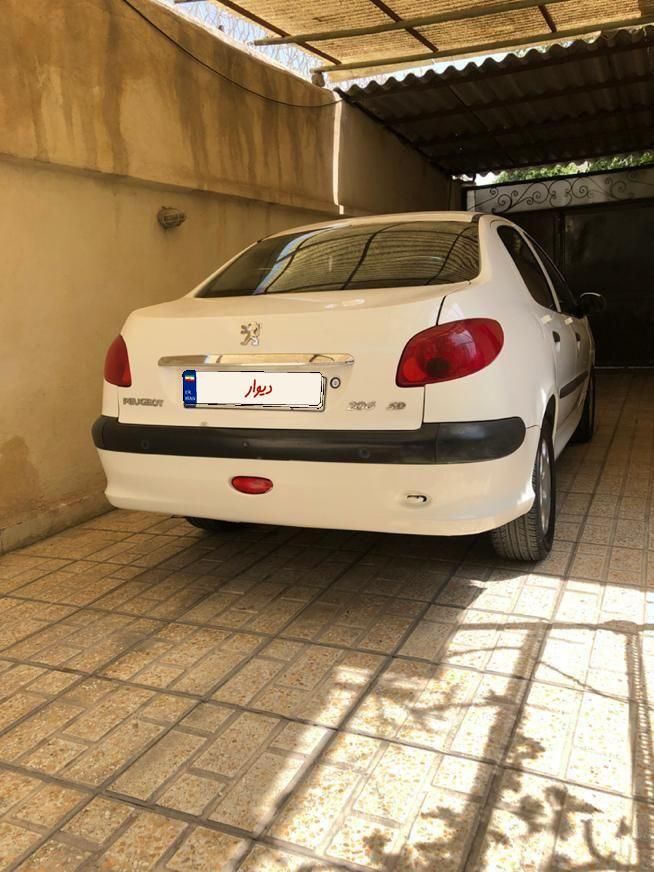 پژو ۲۰۶ صندوق دار v8 - 1396