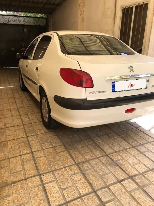پژو ۲۰۶ صندوق دار v8 - 1396