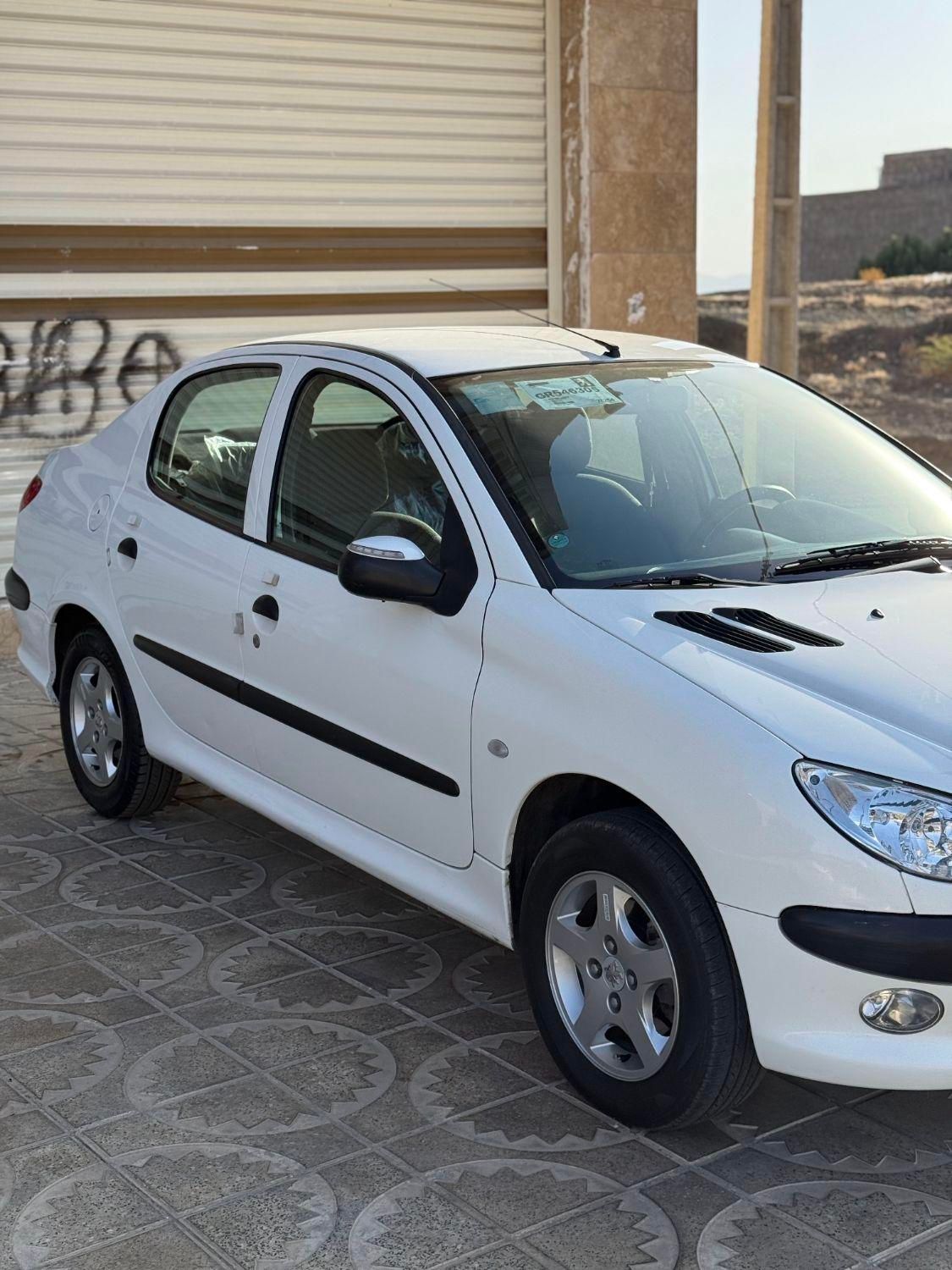 پژو ۲۰۶ صندوق دار v8 - 1396