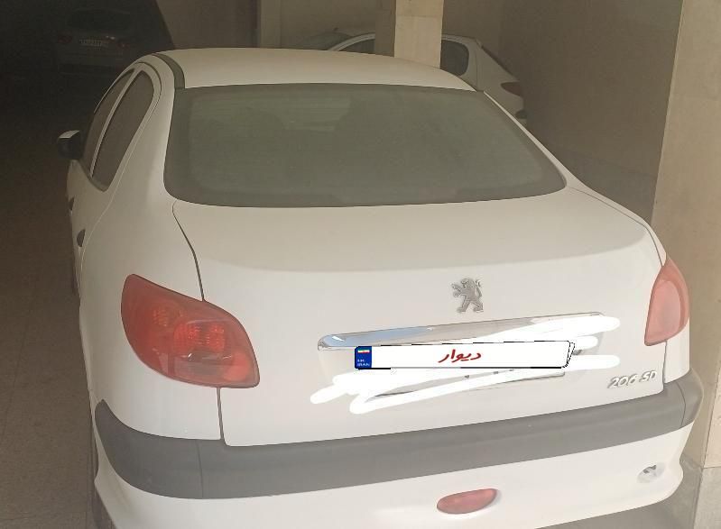 پژو ۲۰۶ صندوق دار v8 - 1391