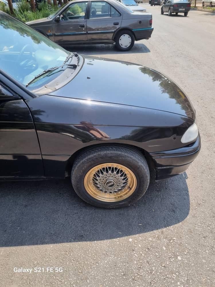 اپل آسترا هاچ بک 1600 شرکتی J - 1995