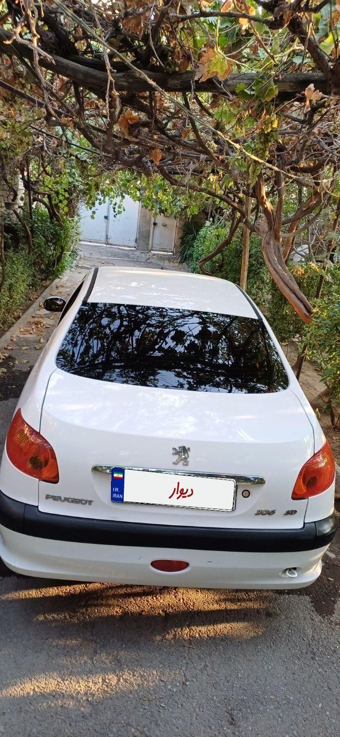 پژو ۲۰۶ صندوق دار v8 - 1393