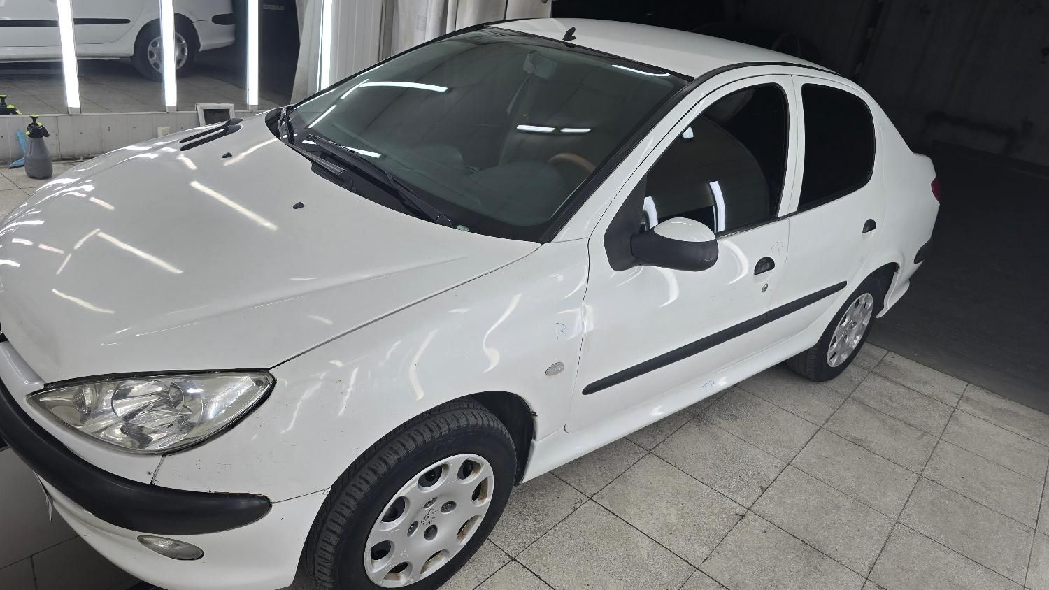 پژو ۲۰۶ صندوق دار v8 - 1396
