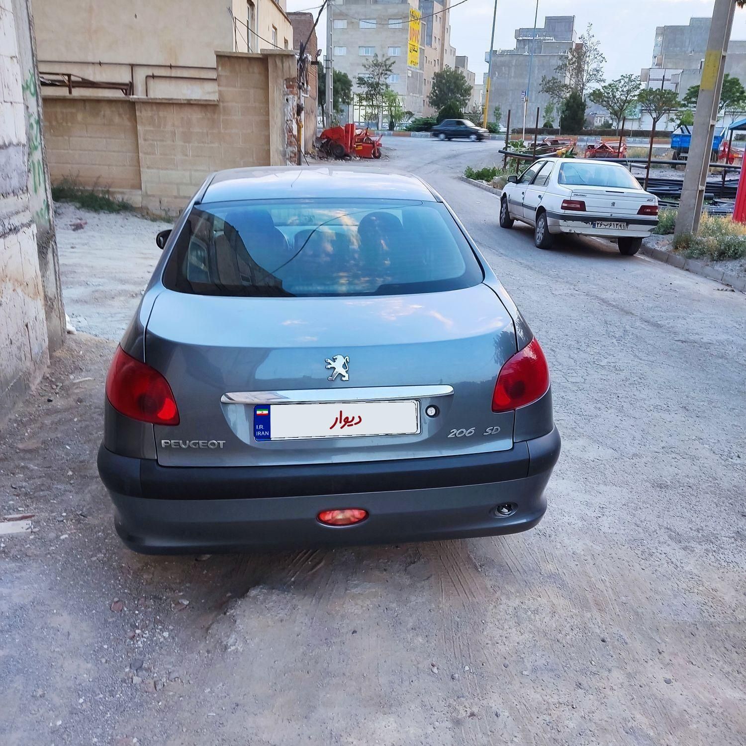 پژو ۲۰۶ صندوق دار v8 - 1391