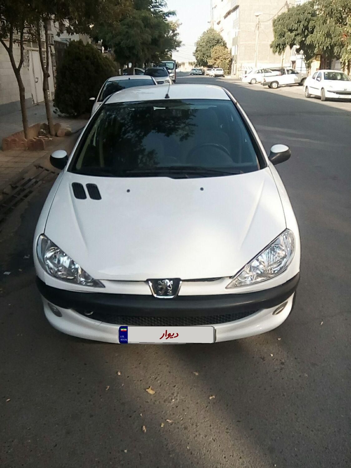 پژو ۲۰۶ صندوق دار v8 - 1396