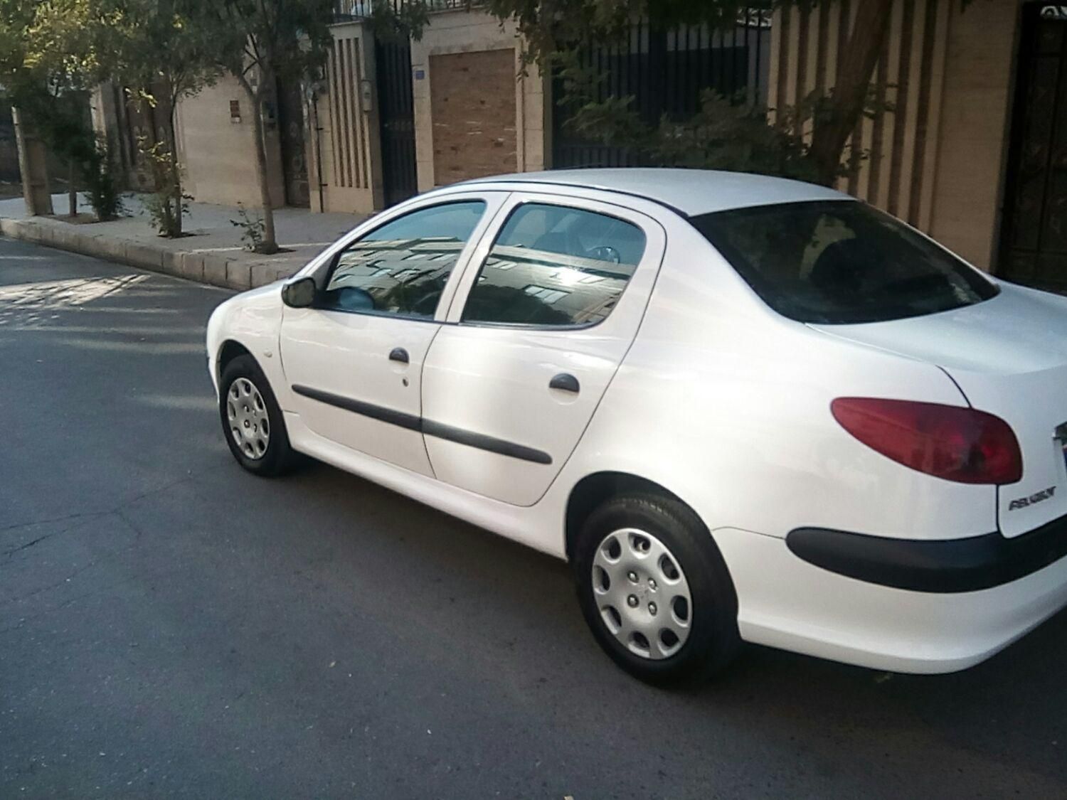 پژو ۲۰۶ صندوق دار v8 - 1396