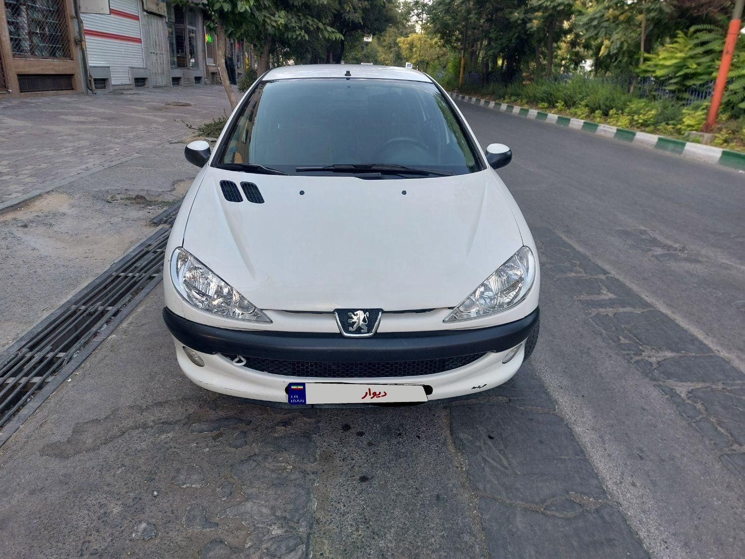 پژو ۲۰۶ صندوق دار v8 - 1397