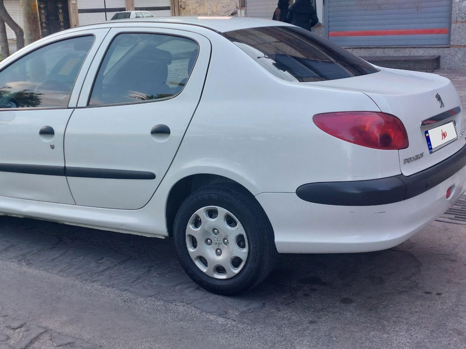 پژو ۲۰۶ صندوق دار v8 - 1397