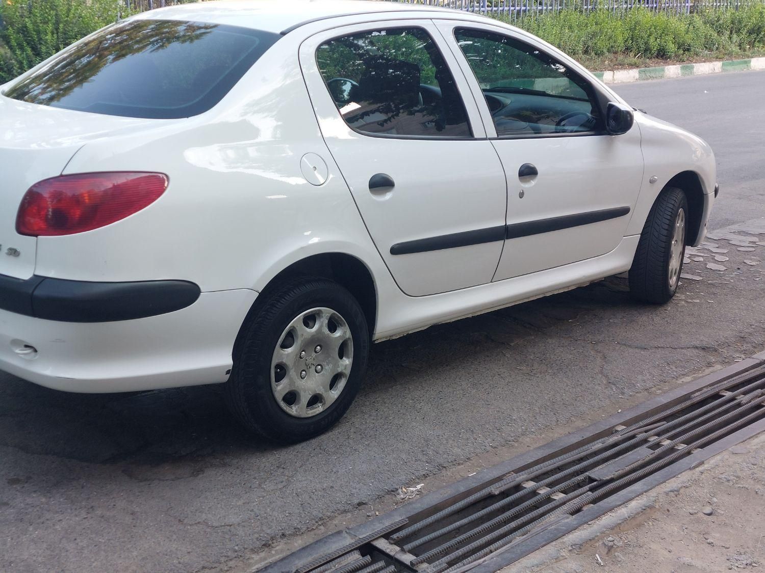 پژو ۲۰۶ صندوق دار v8 - 1397